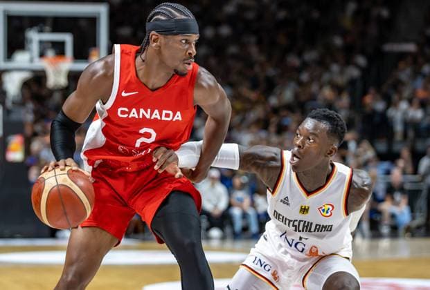 Basketball Laender games, Germany Canada, Mercedes Benz Arena Germanys Dennis Schroeder r fights Shai Gilgeous Alexander from Canada for the ball Basketball Laender game Germany Canada