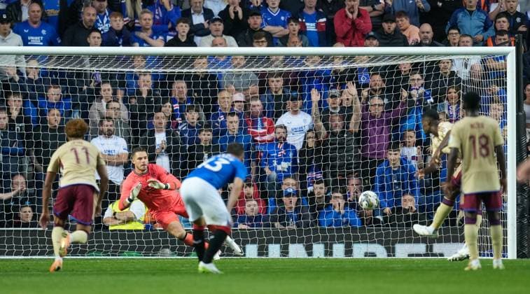 Mandatory Credit: Photo by Stuart Wallace Shutterstock (14047767ag) Chris Bedia of Servette beats Rangers goalkeeper Jack Butland from the penalty spot to reduce Rangers lead to 2-1. Rangers v Servette, UEFA Champions League, Third Qualifying Round, Football, Ibrox Stadium, Glasgow, UK - 09 Aug 2023 EDITORIAL USE ONLY No use with unauthorised audio, video, data, fixture lists, club league logos or live services. Online in-match use limited to 120 images, no video emulation. No use in betting, games or single club league player publications. Rangers v Servette, UEFA Champions League, Third Qualifying Round, Football, Ibrox Stadium, Glasgow, UK - 09 Aug 2023 EDITORIAL USE ONLY No use with unauthorised audio, video, data, fixture lists, club league logos or live services. Online in-match use limited to 120 images, no video emulation. No use in betting, games or single club league player publications. Copyright: xStuartxWallace Shutterstockx 14047767ag