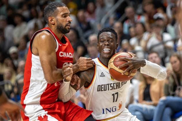 Basketball internationals, Germany Canada, Mercedes Benz Arena Germanys Dennis Schroeder r fights for the ball Basketball internationals Germany Canada