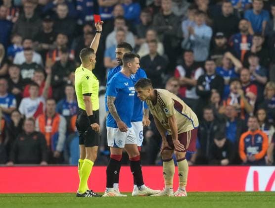 Mandatory Credit: Photo by Stuart Wallace Shutterstock (14047767as) Referee Donatas Rumsas shows a red card to David Douline of Servette for a second yellow card offence, following a foul on Todd Cantwell of Rangers. Rangers v Servette, UEFA Champions League, Third Qualifying Round, Football, Ibrox Stadium, Glasgow, UK - 09 Aug 2023 EDITORIAL USE ONLY No use with unauthorised audio, video, data, fixture lists, club league logos or live services. Online in-match use limited to 120 images, no video emulation. No use in betting, games or single club league player publications. Rangers v Servette, UEFA Champions League, Third Qualifying Round, Football, Ibrox Stadium, Glasgow, UK - 09 Aug 2023 EDITORIAL USE ONLY No use with unauthorised audio, video, data, fixture lists, club league logos or live services. Online in-match use limited to 120 images, no video emulation. No use in betting, games or single club league player publications. Copyright: xStuartxWallace Shutterstockx 14047767as