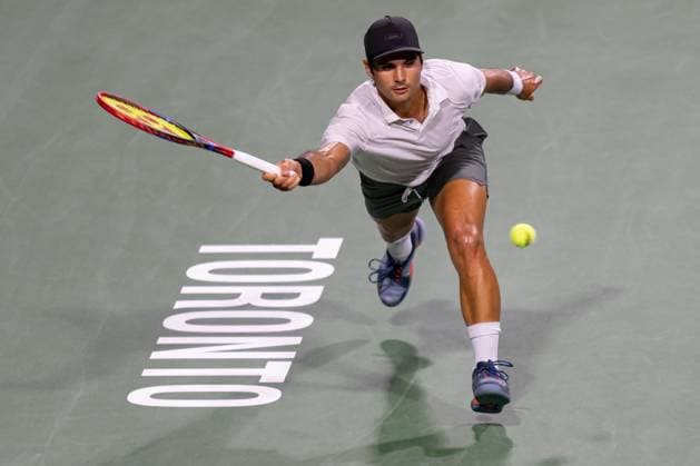 TORONTO, ON - AUGUST 09: Marcos Giron of the United States hits a shot during his second round match of the National Bank Open, part of the Hologic ATP, Tennis Herren Tour, at Sobeys Stadium on August 9, 2023 in Toronto, Canada. (Photo by Julian Avram Icon Sportswire) TENNIS: AUG 09 National Bank Open EDITORIAL USE ONLY Icon2308097932