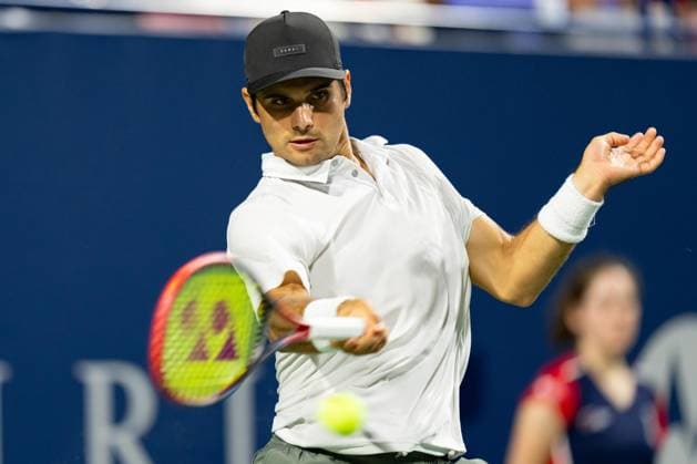 TORONTO, ON - AUGUST 09: Marcos Giron of the United States hits a shot during his second round match of the National Bank Open, part of the Hologic ATP, Tennis Herren Tour, at Sobeys Stadium on August 9, 2023 in Toronto, Canada. (Photo by Julian Avram Icon Sportswire) TENNIS: AUG 09 National Bank Open EDITORIAL USE ONLY Icon2308097944