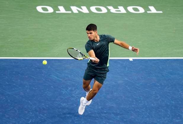 (230810) -- TORONTO, Aug. 10, 2023 -- Carlos Alcaraz of Spain competes during a men s singles second round match between Carlos Alcaraz of Spain and Ben Shelton of the United States at the 2023 National Bank Open in Toronto, Canada, on Aug. 9, 2023. (Photo by Xinhua) (SP) CANADA-TORONTO-TENNIS-NATIONAL BANK OPEN-MEN S SINGLES ZouxZheng 