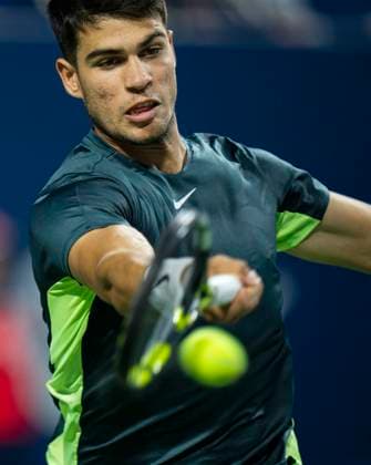 (230810) -- TORONTO, Aug. 10, 2023 -- Carlos Alcaraz of Spain hits a return during a men s singles second round match between Carlos Alcaraz of Spain and Ben Shelton of the United States at the 2023 National Bank Open in Toronto, Canada, on Aug. 9, 2023. (Photo by Xinhua) (SP) CANADA-TORONTO-TENNIS-NATIONAL BANK OPEN-MEN S SINGLES ZouxZheng 