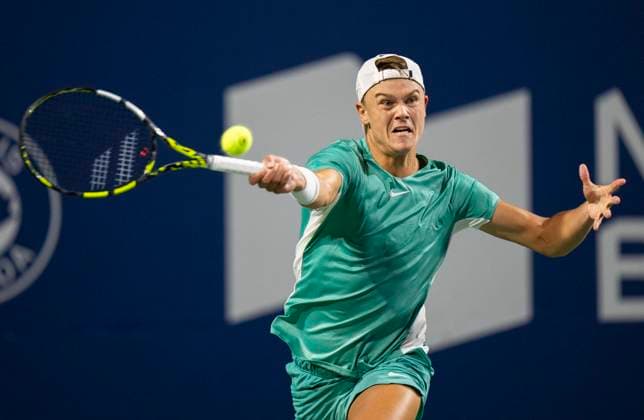 (230810) -- TORONTO, Aug. 10, 2023 -- Holger Rune of Denmark competes during the men s singles round of 32 match between Marcos Giron of the United States and Holger Rune of Denmark at the National Bank Open tennis tournament in Toronto, Canada, on Aug. 9, 2023. (Photo by Xinhua) (SP)CANADA-TORONTO-TENNIS-NATIONAL BANK OPEN-MEN S SINGLES ZouxZheng 