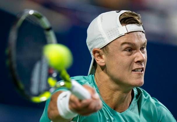 (230810) -- TORONTO, Aug. 10, 2023 -- Holger Rune of Denmark competes during the men s singles round of 32 match between Marcos Giron of the United States and Holger Rune of Denmark at the National Bank Open tennis tournament in Toronto, Canada, on Aug. 9, 2023. (Photo by Xinhua) (SP)CANADA-TORONTO-TENNIS-NATIONAL BANK OPEN-MEN S SINGLES ZouxZheng 