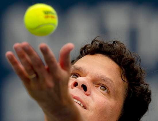 August 10, 2023, TORONTO, ON, Canada: Milos Raonic of Canada tosses the ball to serve to Mackenzie McDonald of the United States in tennis action at the National Bank Open in Toronto, Thursday, Aug. 10, 2023. Canada News - August 10, 2023  - ZUMAc35_ 20230810_zaf_c35_039 Copyright: xFrankxGunnx