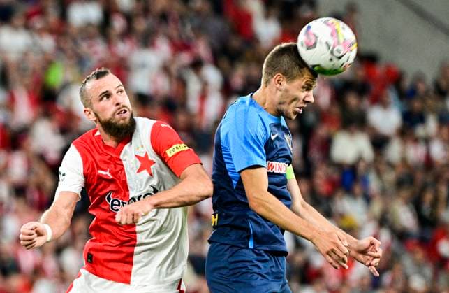 Vaclav Jurecka of Slavia Praha, left, and Eduard Sarapiy of Dnipro in action during the UEFA Europa League first soccer match of 3rd qualifying round: Slavia Praha vs Dnipro, Prague, Czech Republic, August 10, 2023. (CTKxPhoto RomanxVondrous) CTKPhotoP2023081007706  CTKPhotoP2023081007706