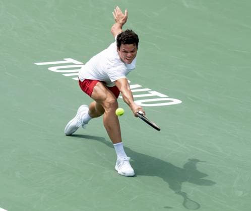 August 10, 2023, TORONTO, ON, Canada: Milos Raonic of Canada hits a return to Mackenzie McDonald of the United States in tennis action at the National Bank Open in Toronto, Thursday, Aug. 10, 2023. Canada News - August 10, 2023  - ZUMAc35_ 20230810_zaf_c35_075 Copyright: xFrankxGunnx