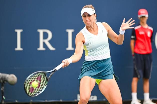 MONTREAL, QC - AUGUST 11: Belinda Bencic (SUI) returns the ball during a third round match at WTA, Tennis Damen National Bank Open on August 11, 2023 at IGA Stadium in Montreal, QC (Photo by David Kirouac Icon Sportswire) TENNIS: AUG 11 National Bank Open EDITORIAL USE ONLY Icon230811021