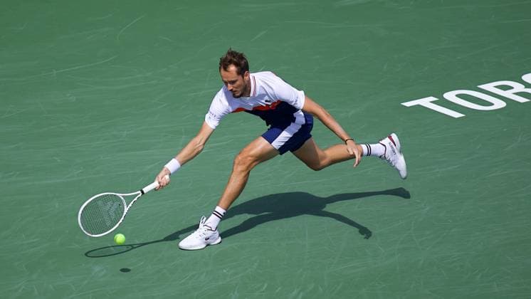 Daniil Medvedev of Russia reaches for the ball during his men s quarter final match against Alex de Minaur of Australia on day seven of the 2023 National Bank Open at Sobeys Arena on August 11, 2023 in Toronto, Ontario, Canada. Noxthirdxpartyxsales  (226193941)