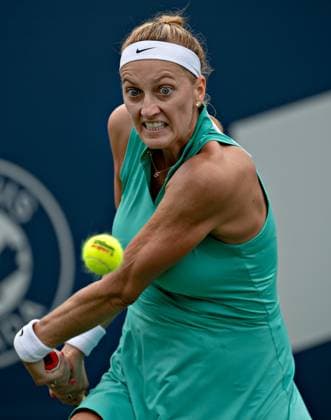 (230812) -- MONTREAL, Aug. 12, 2023 -- Petra Kvitova hits a return during the women s singles round of 16 match between Petra Kvitova of the Czech Republic and Belinda Bencic of Switzerland at the National Bank Open tennis tournament in Montreal, Canada, on Aug. 11, 2023. (Photo by Xinhua) (SP)CANADA-MONTREAL-TENNIS-NATIONAL BANK OPEN-WOMEN S SINGLES AndrewxSoong 
