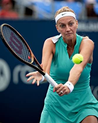 (230812) -- MONTREAL, Aug. 12, 2023 -- Petra Kvitova hits a return during the women s singles round of 16 match between Petra Kvitova of the Czech Republic and Belinda Bencic of Switzerland at the National Bank Open tennis tournament in Montreal, Canada, on Aug. 11, 2023. (Photo by Xinhua) (SP)CANADA-MONTREAL-TENNIS-NATIONAL BANK OPEN-WOMEN S SINGLES AndrewxSoong 