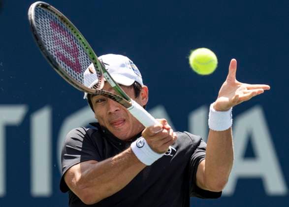 (230812) -- TORONTO, Aug. 12, 2023 -- Mackenzie McDonald hits a return during the men s singles quarterfinal match between Alejandro Davidovich Fokina of Spain and Mackenzie McDonald of the United States at the National Bank Open tennis tournament in Toronto, Canada, Aug. 11, 2023. (Photo by Xinhua) (SP)CANADA-TORONTO-TENNIS-NATIONAL BANK OPEN-MEN S SINGLES ZouxZheng 