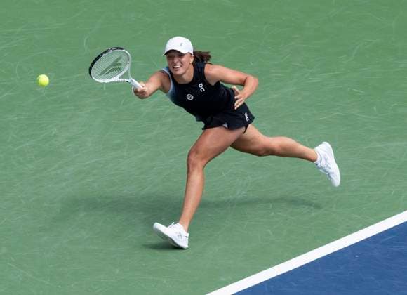 August 12, 2023, MONTREAL, PQ, Canada: Iga Swiatek of Poland, stretches for the ball against Jessica Pegula of the United States, during semifinal action at the National Bank Open tennis tournament in Montreal, Saturday, Aug. 12, 2023. Canada News - August 12, 2023  - ZUMAc35_ 20230812_zaf_c35_002 Copyright: xChristinnexMuschix