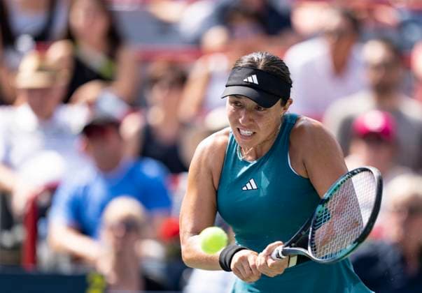 August 12, 2023, MONTREAL, PQ, Canada: Jessica Pegula of the United States, hits a return to Iga Swiatek of Poland, during semifinal action at the National Bank Open tennis tournament in Montreal, Saturday, Aug. 12, 2023. Canada News - August 12, 2023  - ZUMAc35_ 20230812_zaf_c35_019 Copyright: xChristinnexMuschix