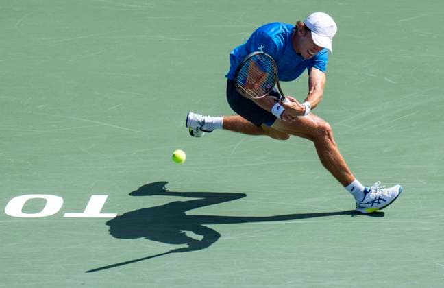 (230813) -- TORONTO, Aug. 13, 2023 -- Alex De Minaur hits a returns during the men s singles semifinal match between Alejandro Davidovich Fokina of Spain and Alex De Minaur of Australia at the 2023 National Bank Open in Toronto, Canada, on Aug. 12, 2023. (Photo by Xinhua) (SP)CANADA-TORONTO-TENNIS-NATIONAL BANK OPEN-MEN S SINGLES ZouxZheng 