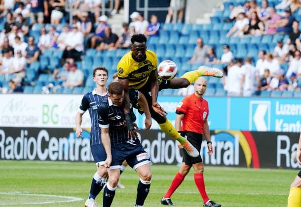 Photo Manuel Geisser 13 08 2023 football men Super League season 2023 2024 FC Luzern BSC Young Boys Silvre Ganvoula YB against Denis Simani FC Luzern below action duel