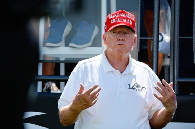 BEDMINSTER, NJ - AUGUST 13: Former President Donals J. Trump at the first tee during the final round of LIV Golf Bedminster on August 13, 2023 at Trump National Golf Club in Bedminster, New Jersey. (Photo by Rich Graessle Icon Sportswire) GOLF: AUG 13 LIV Golf Bedminster EDITORIAL USE ONLY Icon23081422536