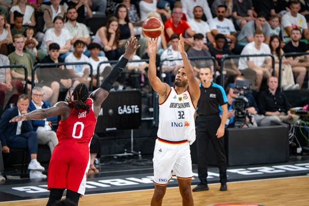 Basketball Hamburg 13 08 2023 DBB national men team international match test match Supercup Germany GER Canada CAN Johannes Thiemann Germany, No 32 Luguentz Dort Canada, No 00