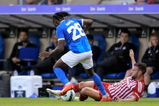 KRC Genk v Olympiacos - UEFA Europa League Qualifying GENK, BELGIUM - AUGUST 17 : Paintsil Joseph forward of KRC Genk battles for the ball with Quini defender of Olympiacos FC during the second leg match of the UEFA Europa League season 2023 - 2024 third qualifying round between KRC Genk and Olympiacos on August 17, 2023 in Genk, BELGIUM, 17 08 2023 Genk BELGIUM  Copyright: xSesx