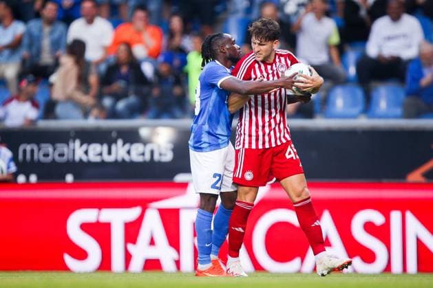 KRC Genk v Olympiacos - UEFA Europa League Qualifying GENK, BELGIUM - AUGUST 17 : Paintsil Joseph of KRC Genk and Restos Panagiotis defender of Olympiacos FC during the second leg match of the UEFA Europa League season 2023 - 2024 third qualifying round between KRC Genk and Olympiacos on August 17, 2023 in Genk, BELGIUM, 17 08 2023 ( Genk BELGIUM  Copyright: xTsx