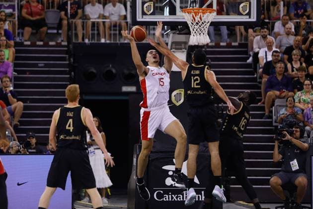 August 17, 2023: Edey of Canada and Santi Aldama of Spain in action during City of Granada Tournament for the Centenary of the FEB, basketball match played between Spain and Canada at Palacio de Deportes on August 17, 2023, in Granada, Spain. - ZUMAa181 20230817_zaa_a181_039 Copyright: xAlexxCamarax