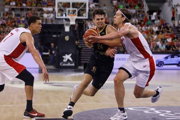 August 17, 2023: Juan Nunez of Spain and Olynyk of Canada in action during City of Granada Tournament for the Centenary of the FEB, basketball match played between Spain and Canada at Palacio de Deportes on August 17, 2023, in Granada, Spain. - ZUMAa181 20230817_zaa_a181_055 Copyright: xAlexxCamarax
