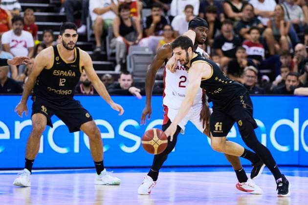 August 17, 2023: Gilgeous-Alexander of Canada and Santi Aldama of Spain in action during City of Granada Tournament for the Centenary of the FEB, basketball match played between Spain and Canada at Palacio de Deportes on August 17, 2023, in Granada, Spain. - ZUMAa181 20230817_zaa_a181_056 Copyright: xJoaquinxCorcherox