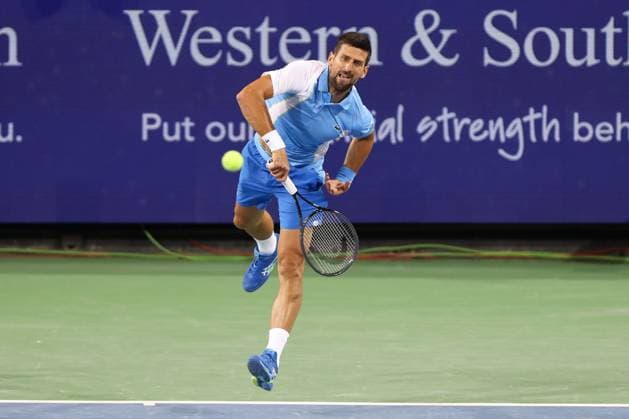 CINCINNATI, OH - AUGUST 17: Novak Djokovic of Serbia watches his serve during the third round at the Western & Southern Open at Lindner Family Tennis Center on August 17, 2023 in Mason, Ohio. (Photo by Ian Johnson Icon Sportswire) TENNIS: AUG 17 Western & Southern Open EDITORIAL USE ONLY Icon230817077