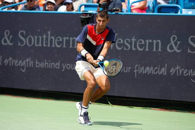 CINCINNATI, OH - AUGUST 18: Alexei Popyrin of Australia hits a backhand during the fourth round at the Western & Southern Open at Lindner Family Tennis Center on August 18, 2023 in Mason, Ohio. (Photo by Ian Johnson Icon Sportswire) TENNIS: AUG 18 Western & Southern Open EDITORIAL USE ONLY Icon230818001