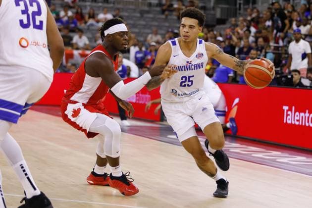 August 18, 2023, GRANADA, GRANADA, SPAIN: Lester Quinones of Dominican Republic and Luguentz Dort of Canada in action during City of Granada Tournament for the Centenary of the FEB, basketball match played between Canada and Dominican Republic at Palacio de Deportes on August 17, 2023, in Granada, Spain. GRANADA SPAIN - ZUMAa181 20230818_zaa_a181_063 Copyright: xAlexxCamarax