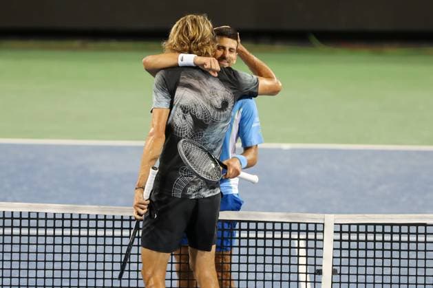 CINCINNATI, OH - AUGUST 19: Alexander Zverev of Germany congratulates Novak Djokovic of Serbia after Djokovic advances to the finals. During the semifinal round at the Western & Southern Open at Lindner Family Tennis Center on August 19, 2023 in Mason, Ohio. (Photo by Ian Johnson Icon Sportswire) TENNIS: AUG 19 Western & Southern Open EDITORIAL USE ONLY Icon230819116