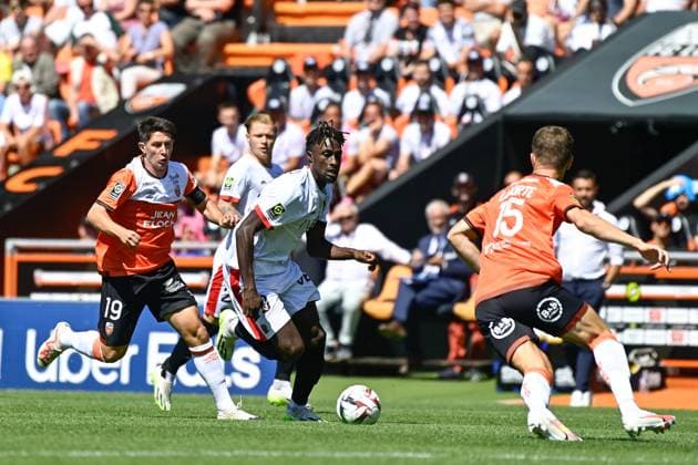 Evann GUESSAND ( 29 - Nice ) - Julien LAPORTE ( 15 - FC Lorient ) - FOOTBALL : Lorient vs Nice - Ligue 1 - 20 08 2023 FedericoPestellini Panoramic 