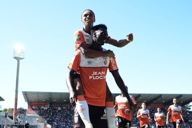 Joie des joueurs de Lorient apres le but de SirinÃ DOUCOURE ( 29 - FC Lorient ) - FOOTBALL : Lorient vs Nice - Ligue 1 - 20 08 2023 FedericoPestellini Panoramic 
