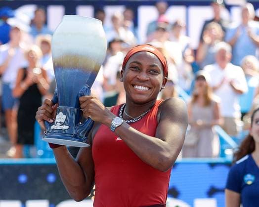 CINCINNATI, OH - AUGUST 20: Coco Gauff of the United States poses with the Rookwood Cup after defeating Karolina Muchova of the Czech Republic 6-3, 6-4. In the final round at the Western & Southern Open at Lindner Family Tennis Center on August 20, 2023 in Mason, Ohio. (Photo by Ian Johnson Icon Sportswire) TENNIS: AUG 20 Western & Southern Open EDITORIAL USE ONLY Icon230820026
