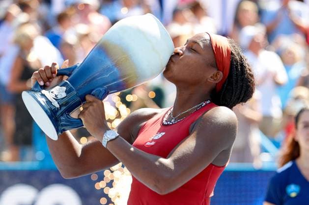 CINCINNATI, OH - AUGUST 20: Coco Gauff of the United States kisses the Rookwood Cup after defeating Karolina Muchova of the Czech Republic 6-3, 6-4. In the final round at the Western & Southern Open at Lindner Family Tennis Center on August 20, 2023 in Mason, Ohio. (Photo by Ian Johnson Icon Sportswire) TENNIS: AUG 20 Western & Southern Open EDITORIAL USE ONLY Icon230820035