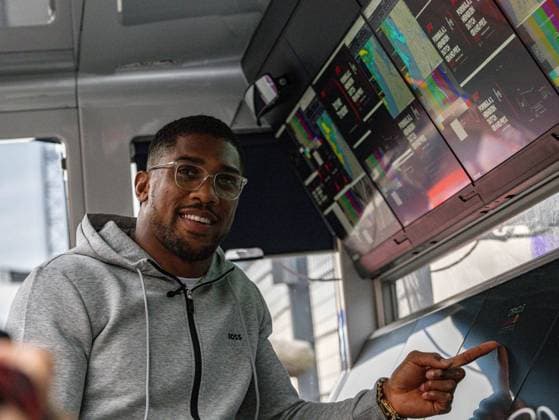 24th August 2023; Circuit Zandvoort, Zandvoort, North Holland, Netherlands; Formula 1 Heineken Dutch Grand Prix 2023; Arrivals and Inspection Day; Anthony Joshua OBE two times unified World Heavyweight boxing champion enjoys some time with the Red Bull team in the strategy seat  ActionPlus12546419 GodfreyxPitt