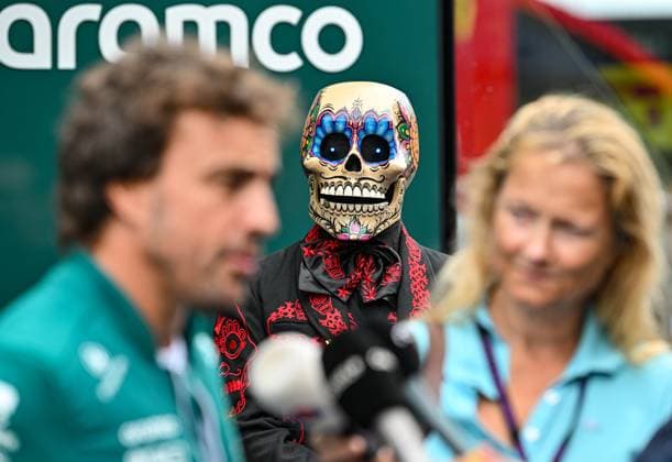 24th August 2023; Circuit Zandvoort, Zandvoort, North Holland, Netherlands; Formula 1 Heineken Dutch Grand Prix 2023; Arrivals and Inspection Day; A Mexican skull watches Fernando Alonso (ESP) being interviewed  ActionPlus12546483 GodfreyxPitt