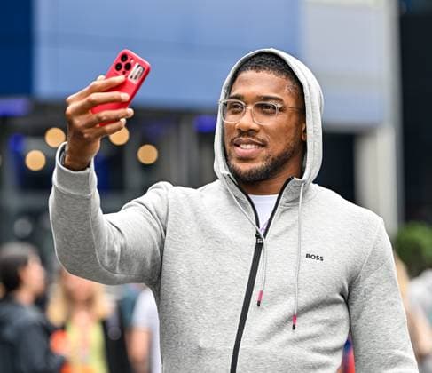 24th August 2023; Circuit Zandvoort, Zandvoort, North Holland, Netherlands; Formula 1 Heineken Dutch Grand Prix 2023; Arrivals and Inspection Day; Twice heavyweight boxing champion of the world Anthony Joshua OBE takes a selfie in the paddock  ActionPlus12546484 GodfreyxPitt