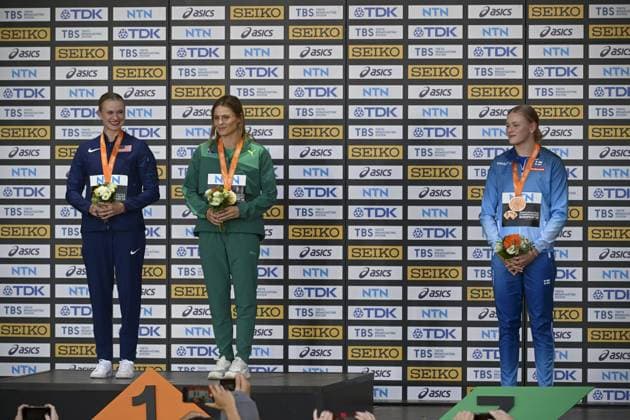 Katie Moon of United States, Nina Kennedy of Australia, and Wilma Murto of Finland on the podium at the medal ceremony for women s pole vault at the IAAF World Athletics Championships in Budapest on August 24, 2023. Budapest Hungary LKFTJK20230824191441LTWG  Copyright: xAnttixAimo-Koivistox LKFTJK20230824191441LTWG