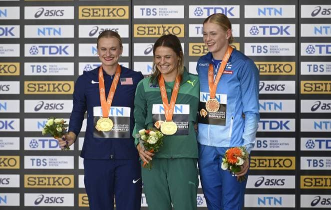 Katie Moon of United States, Nina Kennedy of Australia, and Wilma Murto of Finland on the podium at the medal ceremony for women s pole vault at the IAAF World Athletics Championships in Budapest on August 24, 2023. Moon and Kennedy shared the gold medal, and Murto placed third. Budapest Hungary LKFTJK20230824191750JLYO  Copyright: xAnttixAimo-Koivistox LKFTJK20230824191750JLYO