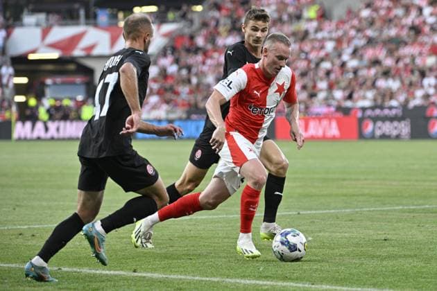 L-R Roman Vantukh (Luhansk), Oleksandr Yatsyk (Luhansk) and Petr Sevcik (Slavia) in action during the UEFA Europa League, play-off, 1st leg, SK Slavia Praha vs FC Zorya Luhansk, on August 24, 2023, in Prague, Czech Republic. (CTKxPhoto VitxSimanek) CTKPhotoP2023082407684  CTKPhotoP2023082407684