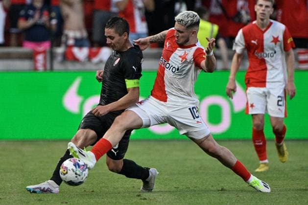 L-R Dmytro Myshnyov (Luhansk) and Christos Zafeiris (Slavia) in action during the UEFA Europa League, play-off, 1st leg, SK Slavia Praha vs FC Zorya Luhansk, on August 24, 2023, in Prague, Czech Republic. (CTKxPhoto VitxSimanek) CTKPhotoP2023082407975  CTKPhotoP2023082407975
