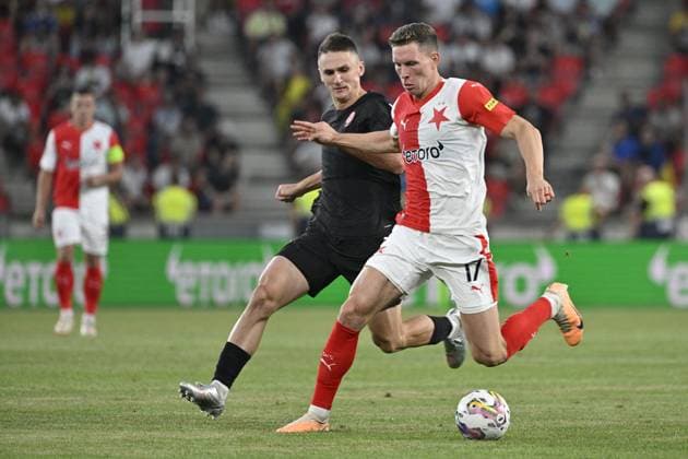 L-R Denys Antyukh (Luhansk) and Lukas Provod (Slavia) in action during the UEFA Europa League, play-off, 1st leg, SK Slavia Praha vs FC Zorya Luhansk, on August 24, 2023, in Prague, Czech Republic. (CTKxPhoto VitxSimanek) CTKPhotoP2023082408125  CTKPhotoP2023082408125