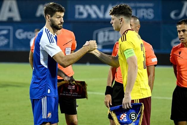 Dinamo Zagreb v Sparta Praha - UEFA Europa League Play Off Round: First Leg ZAGREB, CROATIA - AUGUST 24: Bruno Petkovic of Dinamo Zagreb and Ladislav Krejci of Sparta Praha shake hands ahead UEFA Europa League Play Off Round First Leg match between Dinamo Zagreb and Sparta Praha at Maksimir Stadium on August 24, 2023 in Zagreb, Croatia. MarkoxLukunic PIXSELL