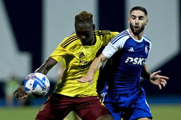 Dinamo Zagreb v Sparta Praha - UEFA Europa League Play Off Round: First Leg ZAGREB, CROATIA - AUGUST 24: Victor Olatunji of Sparta Praha and Luka Ivanusec of Dinamo Zagreb in action during UEFA Europa League Play Off Round First Leg match between Dinamo Zagreb and Sparta Praha at Maksimir Stadium on August 24, 2023 in Zagreb, Croatia. MarkoxLukunic PIXSELL