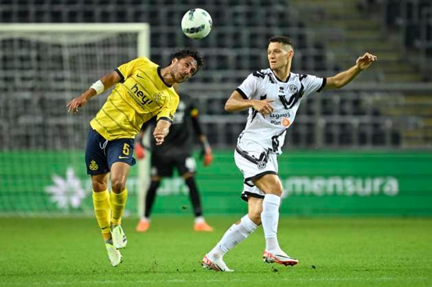 Union SG v FC Lugano - UEFA Europa League BRUSSELS, BELGIUM - AUGUST 24 : Mac Allister Kevin defender of Union St-Gilloise heads a ball in front of Celar Zan forward of FC Lugano during the UEFA Europa League Play-offs, 1st leg match between Union SG and FC Lugano at the Anderlecht stadium on August 24, 2023 in Brussels, Belgium, 24 08 2023 Brussels Belgium  Copyright: xNicoxVereeckenx