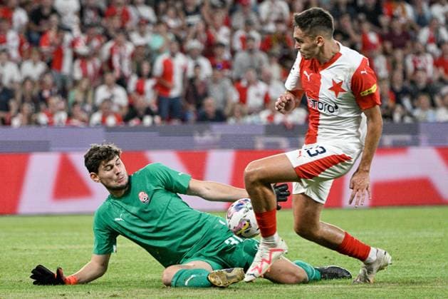 L-R goalkeeper Mykyta Turbayevskyi (Luhansk), and Mojmir Chytil (Slavia) in action during the UEFA Europa League, play-off, 1st leg, SK Slavia Praha vs FC Zorya Luhansk, on August 24, 2023, in Prague, Czech Republic. (CTKxPhoto VitxSimanek) CTKPhotoP2023082408648  CTKPhotoP2023082408648