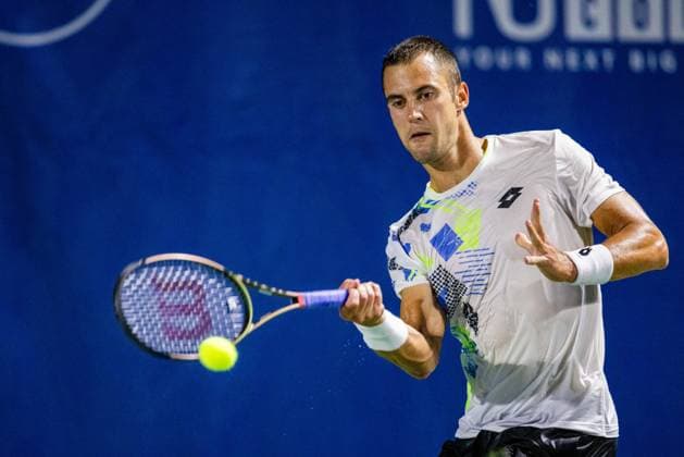 August 24, 2023: Laslo Djere returns the ball to Sebastian Baez during the quarterfinals of the 2023 Winston-Salem Open at Wake Forest Tennis Complex in Wnston-Salem, NC. ( CSM) Wnston-Salem United States - ZUMAc04_ 20230824_zma_c04_125 Copyright: xScottxKinserx